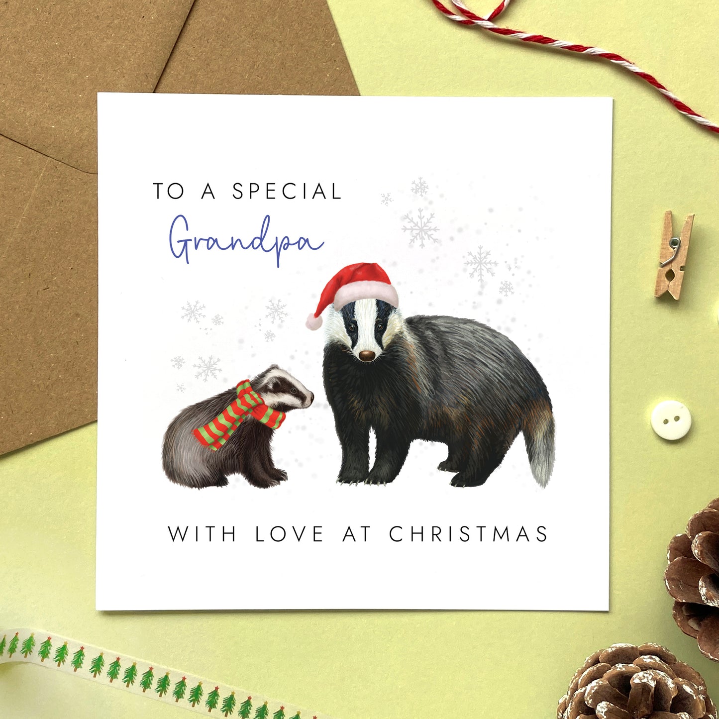 A personalised Christmas Card for Grandpa featuring a Father Badger and Baby Badger.