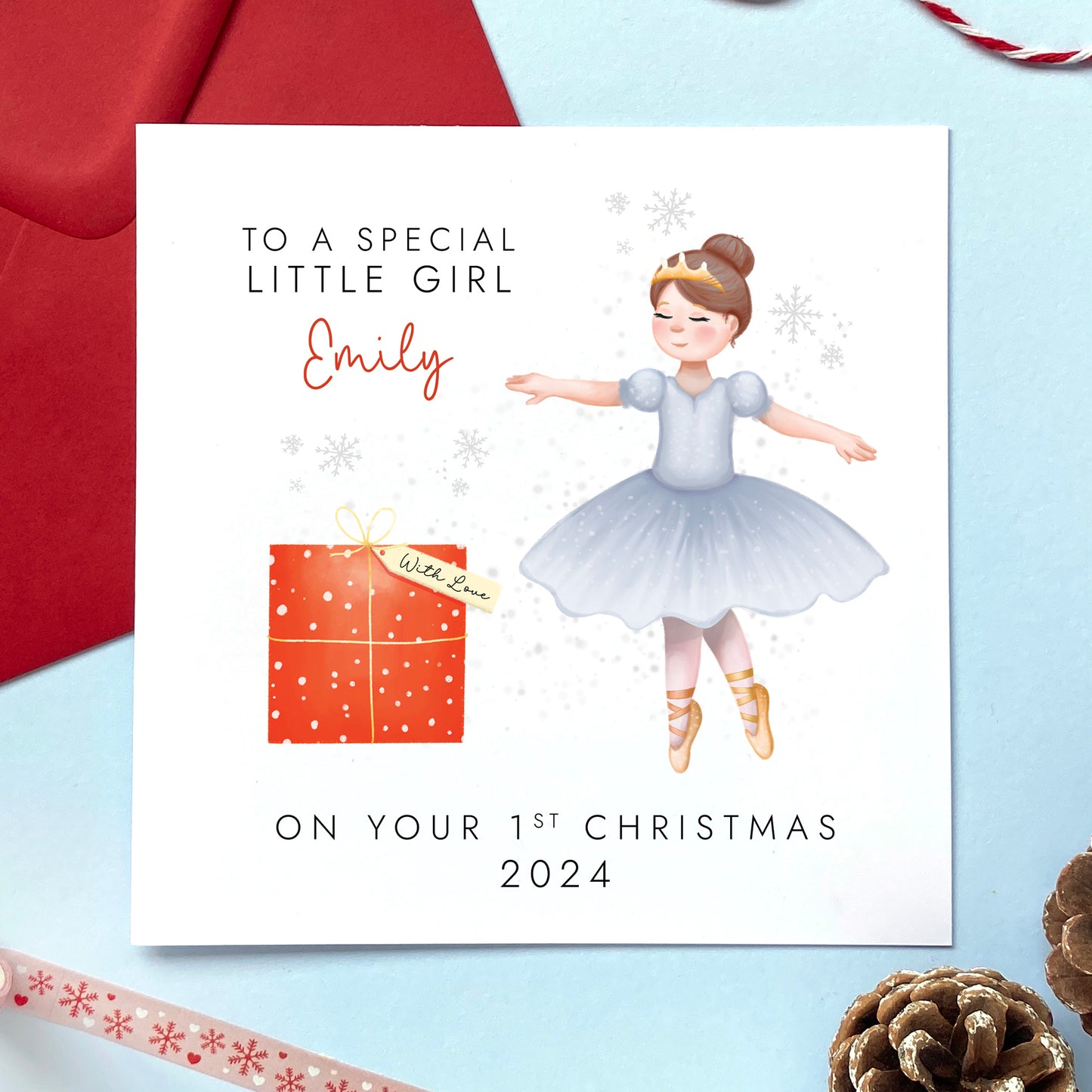 A personalised Ballerina 1st Christmas Card for a baby girl's First Christmas. It can be personalised with a name and has the year 2024.