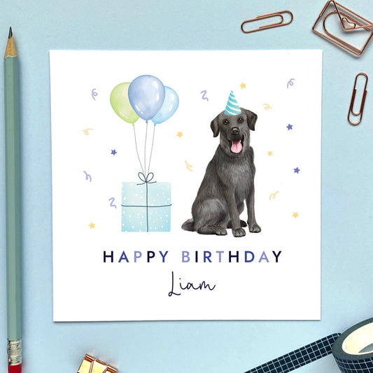 A personalised black labrador dog birthday card for Him. It can be personalised with any name and age.