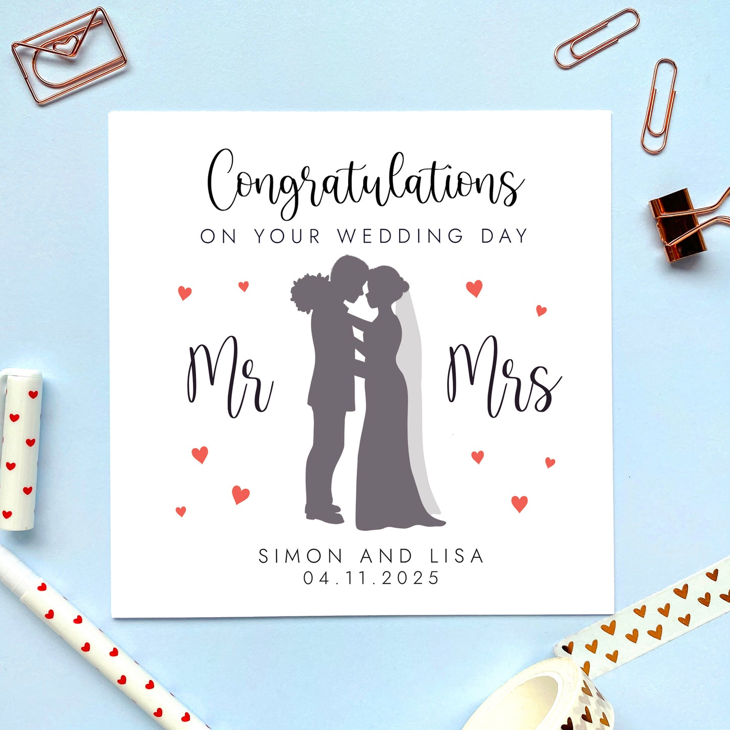 A personalised Congratulations on your Wedding Day Card for Mr and Mrs, featuring a silhouette of a bride and groom, for a just married couple.