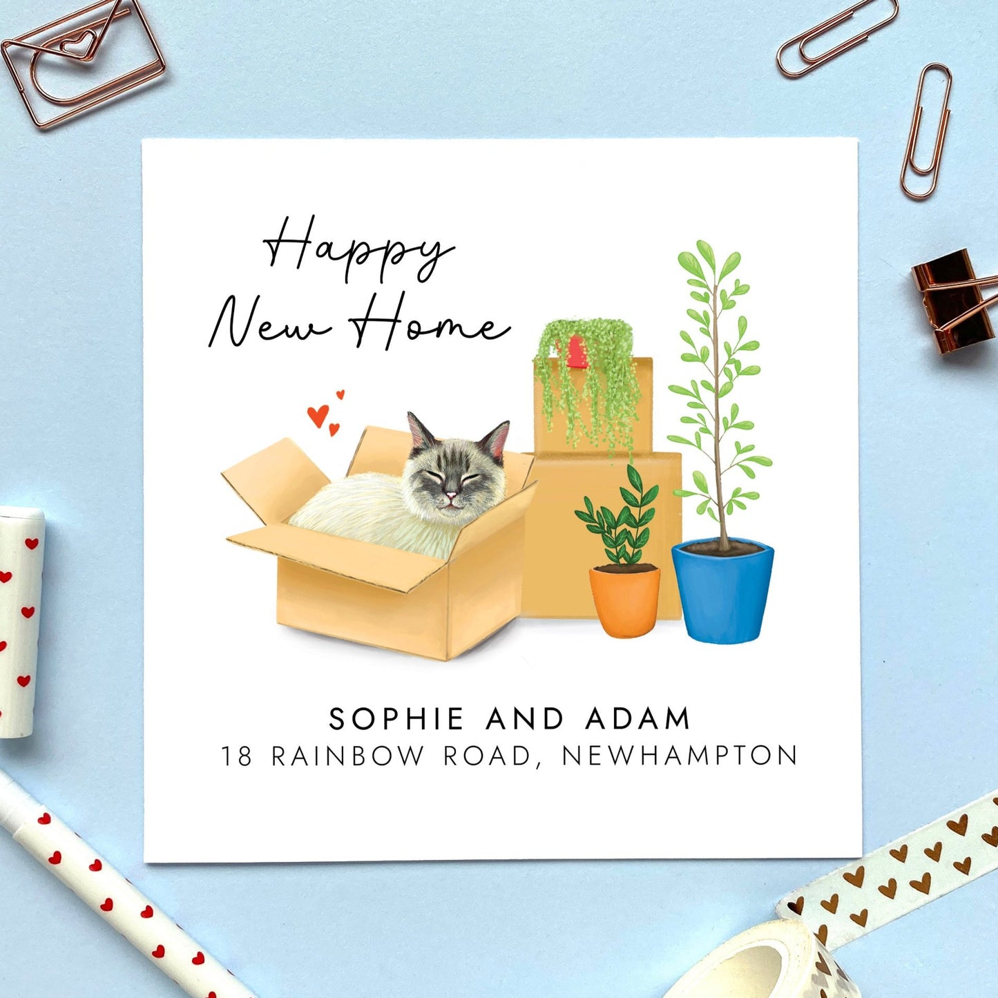 A personalised Happy New Home card featuring a ragdoll cat in a box.