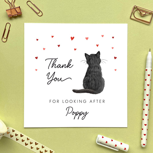 Personalised cat thank you card, the cat design can be chosen from a range of designs. The cat on the card photo is a black cat. The wording reads 'thank you for looking after Poppy'.