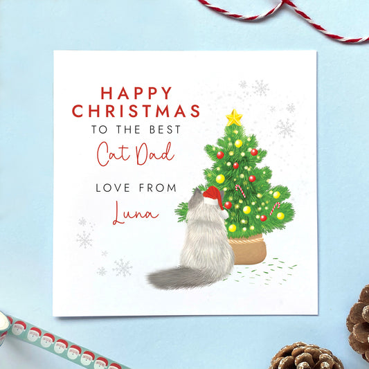 A personalised from the cat christmas card for cat dad. It can be personalised by choosing the cat on the card and the cat's name. The card in the photo is a ragdoll cat christmas card.