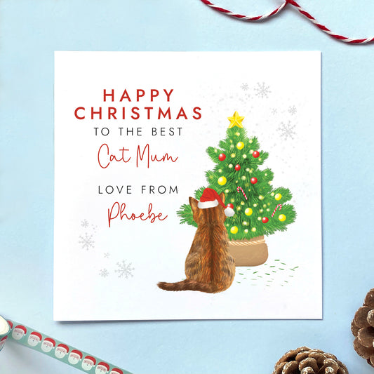 A personalised from the cat christmas card for cat mum. It can be personalised by choosing the cat on the card and the cat's name. The card in the photo is a brown tabby cat christmas card.
