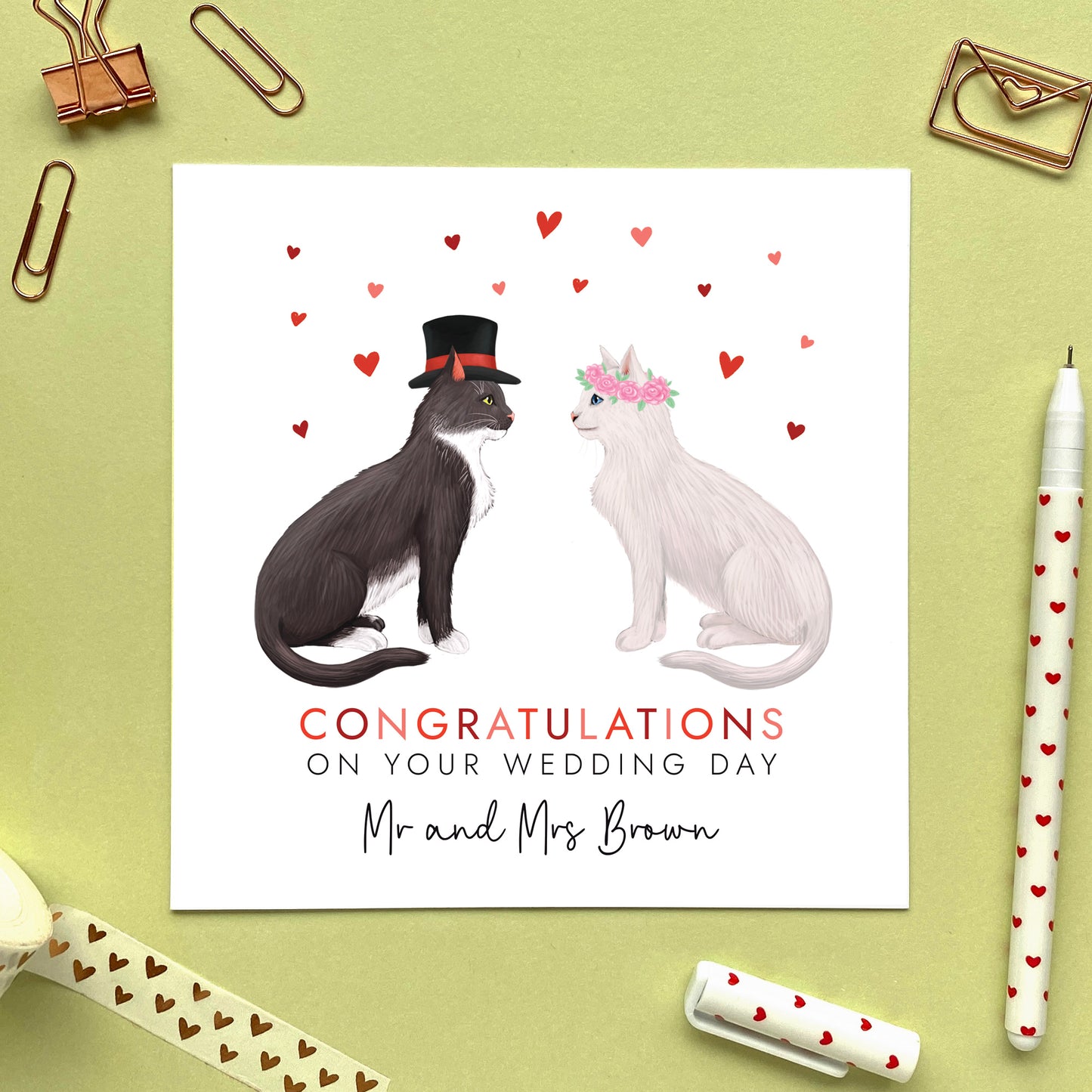 A personalised congratulations on your wedding day card for Mr and Mrs. You can choose both cats on the card. It's ideal for any couple who are just married, such as daughter and son-in-law, son and daughter-in-law, grandson and wife, granddaughter and husband, friends and family.