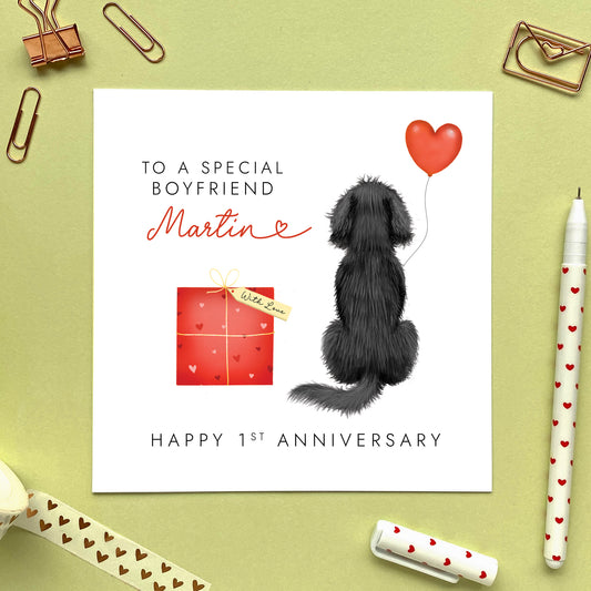A personalised anniversary card for Boyfriend featuring a Black Cocker Spaniel. It can be personalised with a name and is suitable for both him and her. Ideal for husband, wife, fiancé, fiancée, boyfriend and girlfriend, for any anniversary such as 1st wedding anniversary.