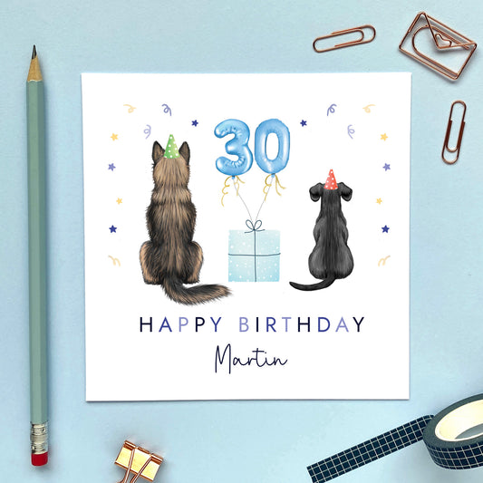 A personalised dog themed birthday card for him where you can choose the two dogs from different breeds. The card in the photo is a 30th birthday card for him featuring a german shepherd and a black dachshund.