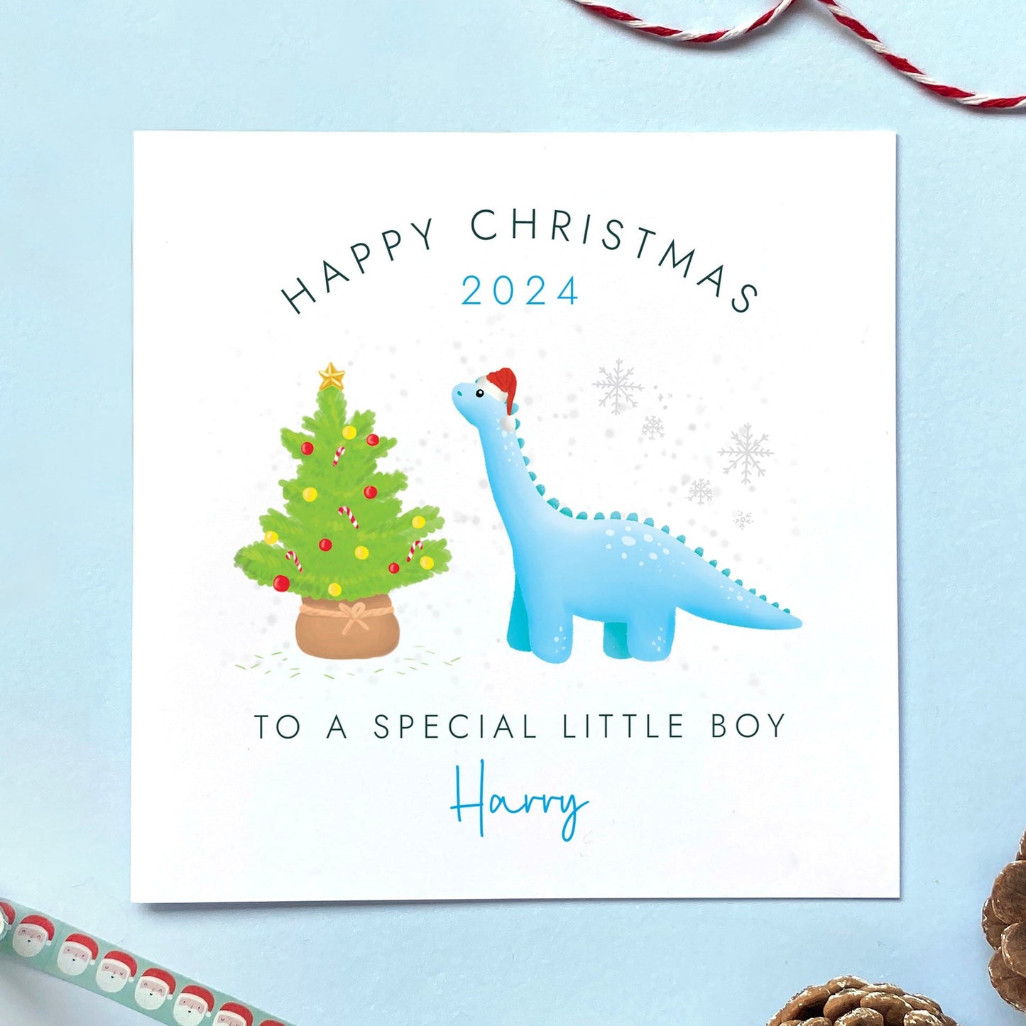 A personalised Dinosaur Christmas Card for a special little boy.
