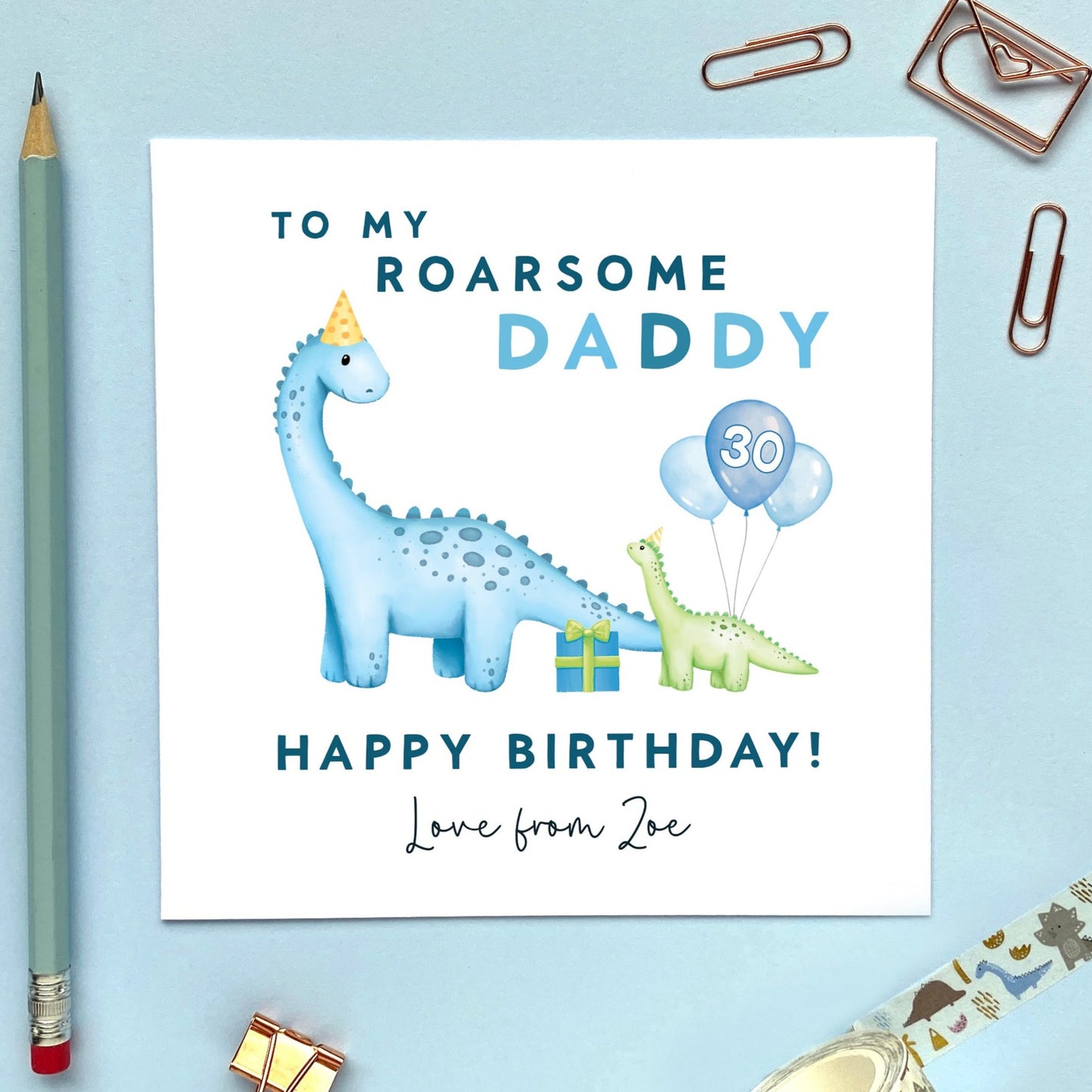 A Personalised Dinosaur Birthday Card for Daddy. It can be personalised with a child's name and any age. The card in the photo is a 30th Birthday Card for Daddy.