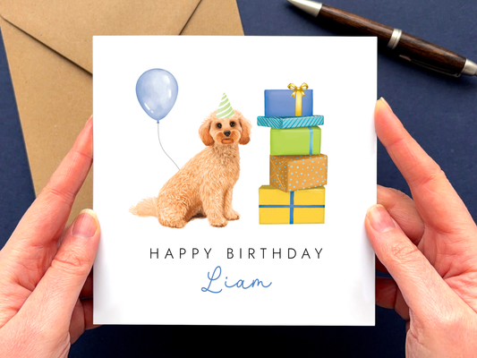 A personalised dog birthday card for him featuring a golden cockapoo.