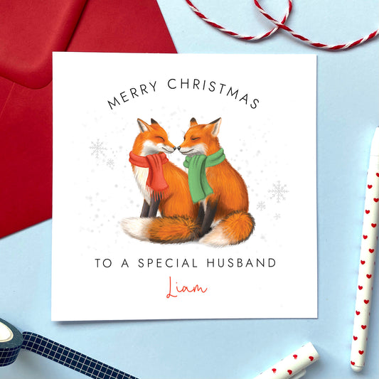 A personalised fox couple Christmas card for a special Husband.