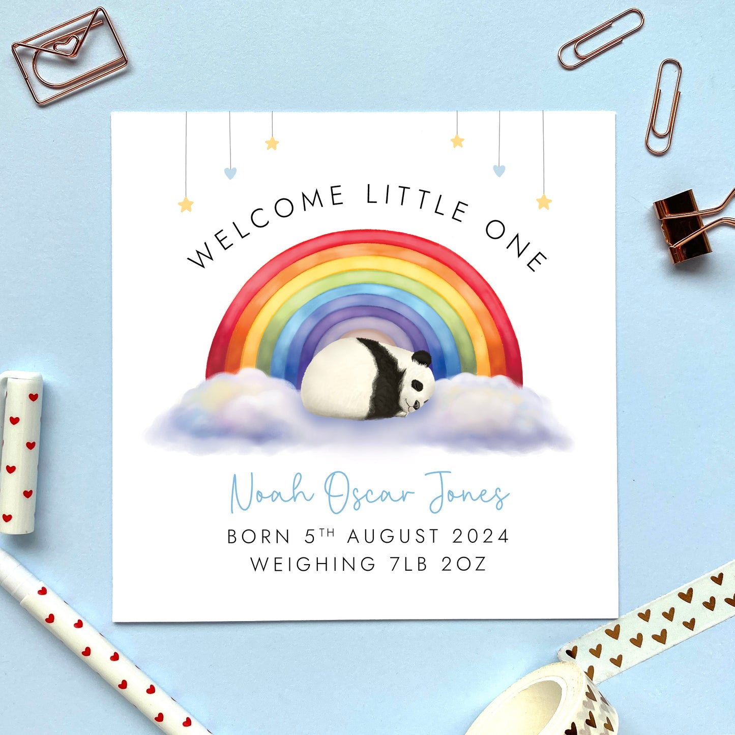 A personalised New Baby Card for Boy. It features a sleeping baby panda under a rainbow and can be personalised with the baby's name, date of birth and weight.