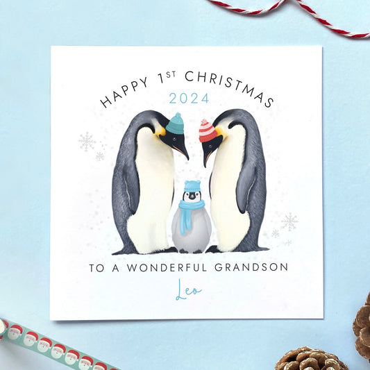 A personalised penguins first christmas card for Grandson. Ideal for any little baby boy's 1st christmas.