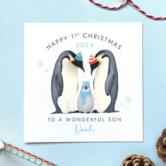 A personalised penguins first christmas card for Son. Ideal for any little baby boy's 1st christmas.