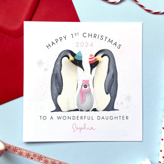 A personalised 1st Christmas Card for Baby Girl. The card in the photo is a first Christmas card for Daughter.