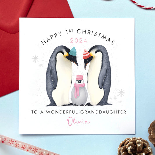 A personalised 1st Christmas Card for Baby Girl. The card in the photo is a first Christmas card for Granddaughter.