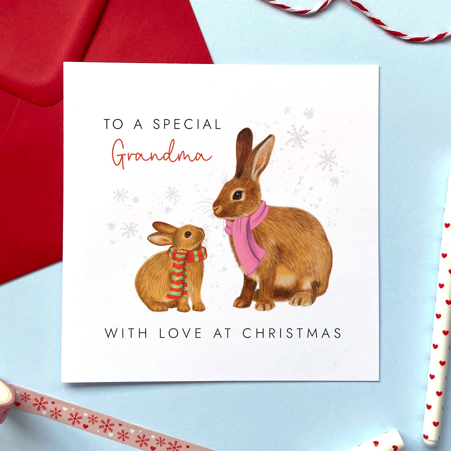 A personalised Christmas Card for Grandma featuring a brown Mother Rabbit and a baby bunny.
