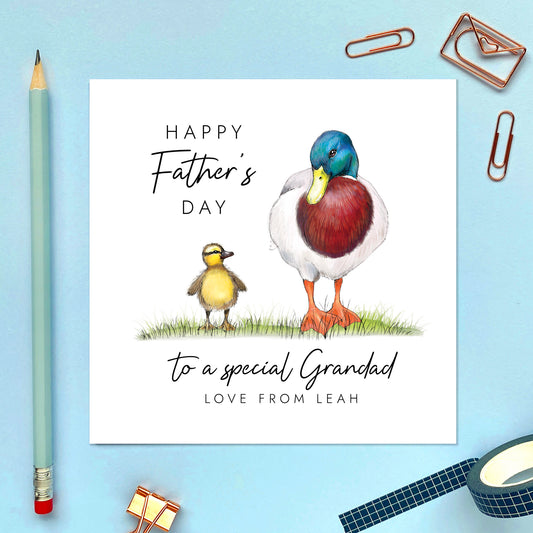 A personalised father's day card for Grandad featuring a mallard duck and baby duckling. This card is from one child and can be customised with his or her name.