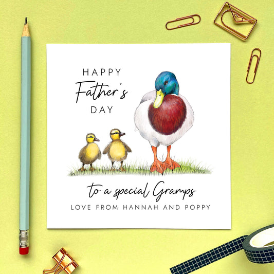 A personalised father's day card for Gramps featuring a mallard duck and 2 baby ducklings. This card is from two children and can be customised with their names.