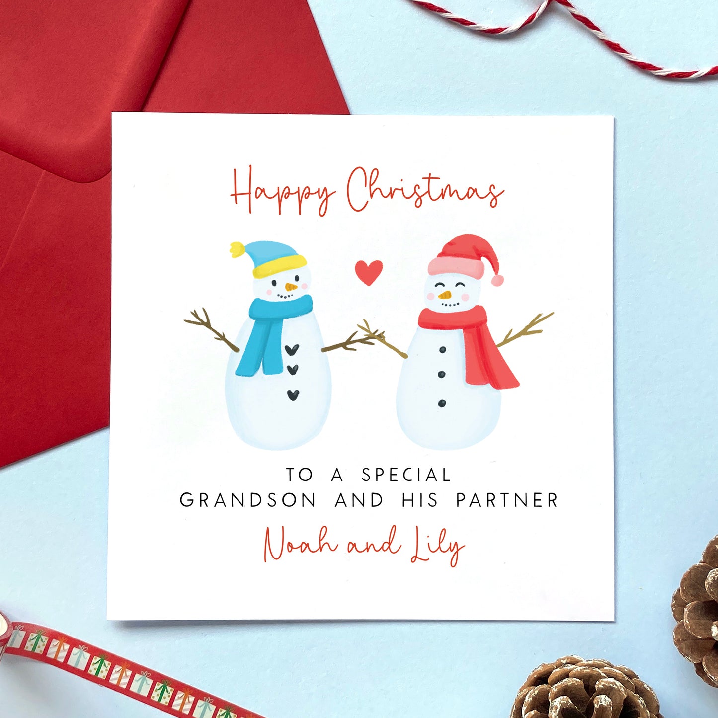 A personalised snowman couple Christmas card for a special Grandson and his Partner.