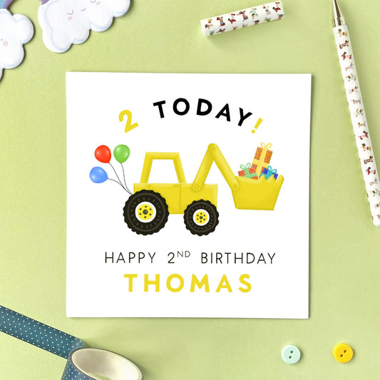 A personalised 2nd birthday card featuring a yellow digger or tractor. It's suitable for little boy, including Son, Grandson, Nephew, Brother, Cousin and Godson. It can be personalised with a name.