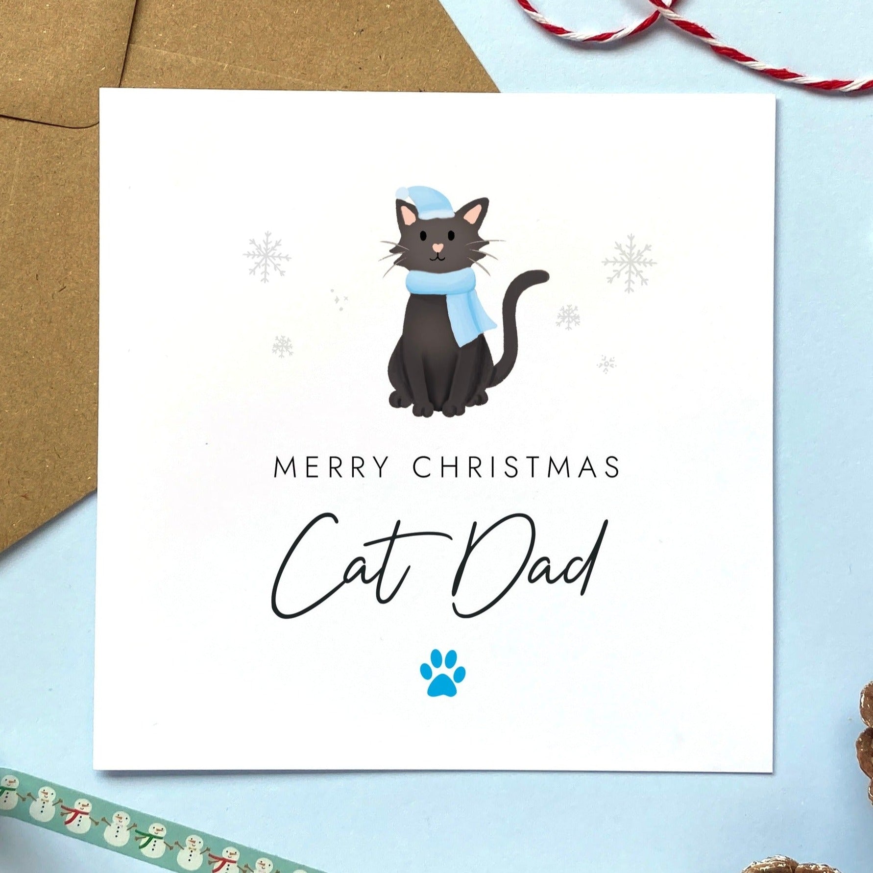 A personalised Christmas card for Cat Dad featuring a black cat. It can be personalised by changing the relation and the cat. It's designed as a special Christmas card from the cat.