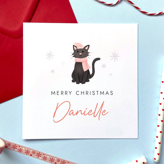 A personalised Christmas card for Her featuring a black cat. It can be personalised by adding a name or relation. It's designed as a special Christmas card for female relations such as Daughter, Granddaughter, Niece, Sister and Mum.