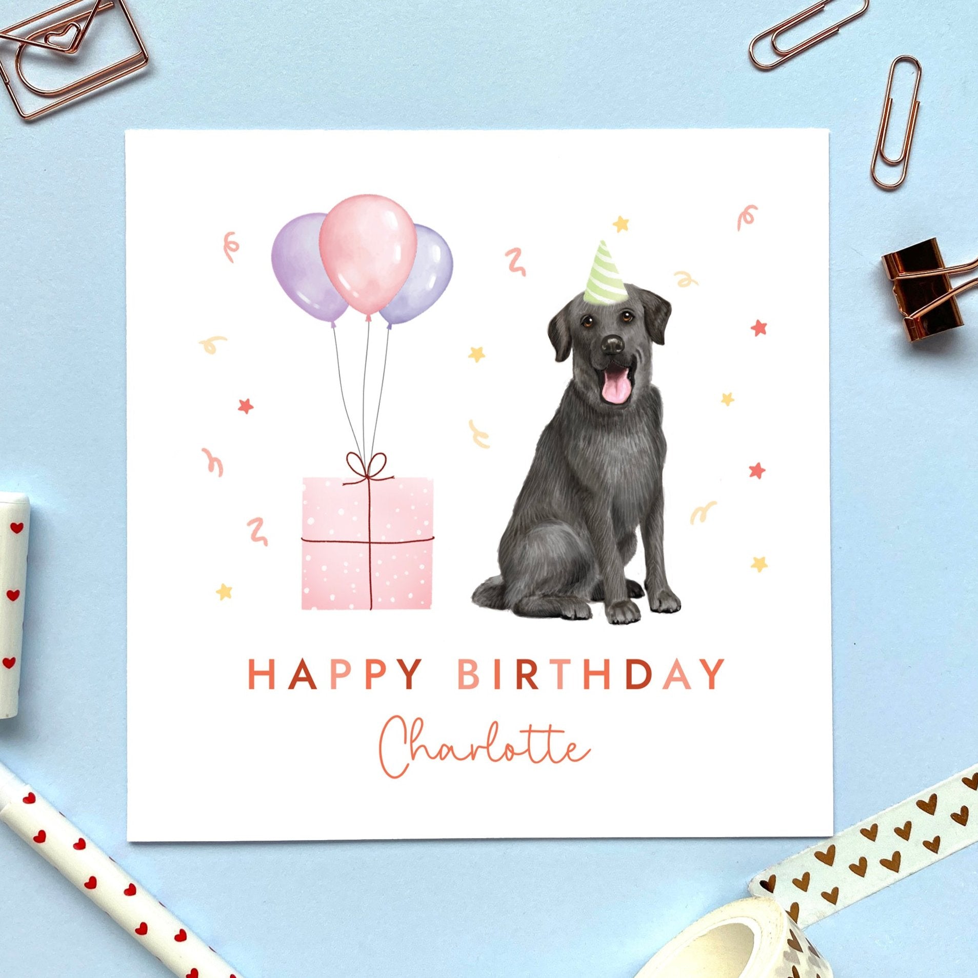 A personalised black labrador dog birthday card for her. It can be personalised with any name and number.