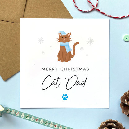 A personalised Christmas card for Cat Dad featuring a brown cat. It can be personalised by changing the relation and the cat. It's designed as a special Christmas card from the cat.