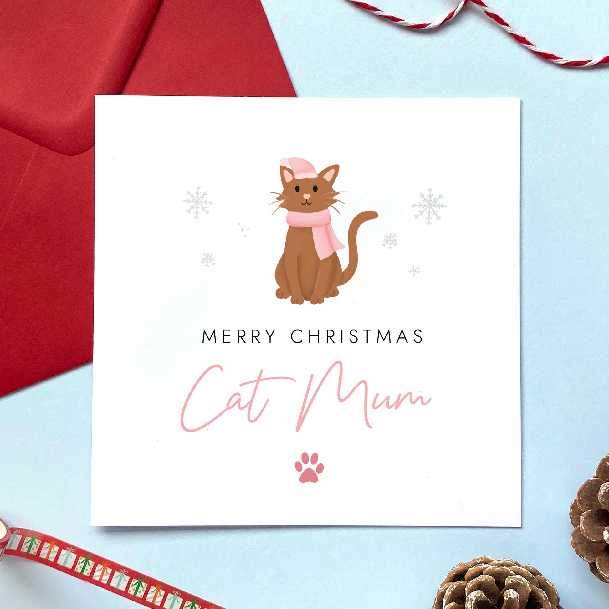 A personalised Christmas card for Cat Mum featuring a brown cat. It can be personalised by changing the relation and the cat. It's designed as a special Christmas card from the cat.