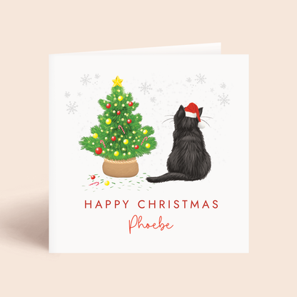 Personalised Cat Christmas card with a black cat and decorated tree on a beige background