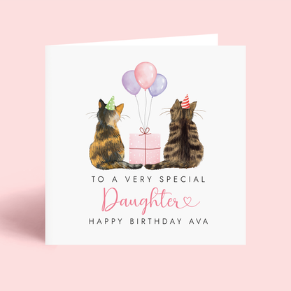 Personalised Birthday card for Daughter with two cats holding balloons and a gift, on a pink background.