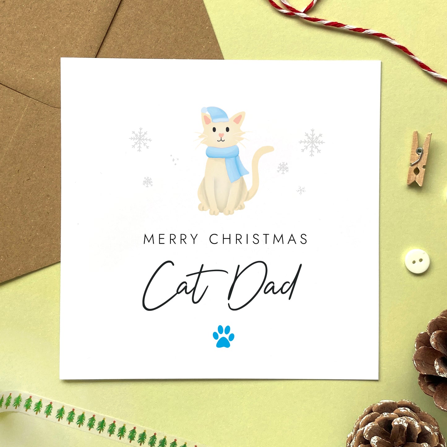 A personalised Christmas card for Cat Dad featuring a cream cat. It can be personalised by changing the relation and the cat. It's designed as a special Christmas card from the cat.