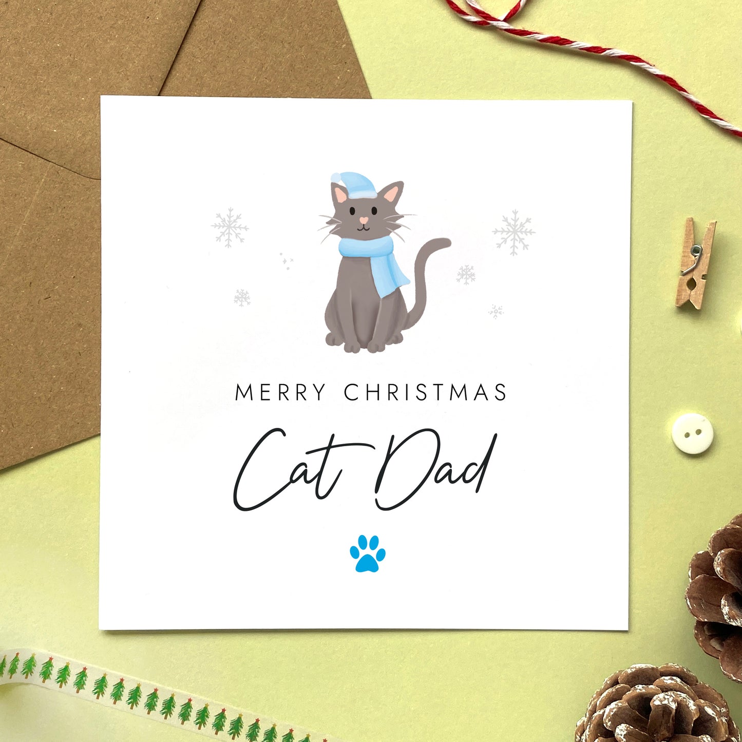 A personalised Christmas card for Cat Dad featuring a dark grey cat. It can be personalised by changing the relation and the cat. It's designed as a special Christmas card from the cat.