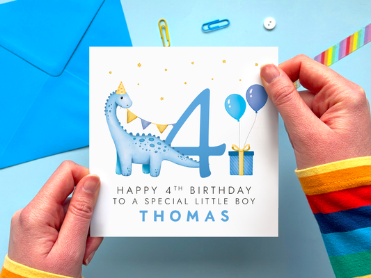 personalised blue dinosaur 4th birthday card for special little boy