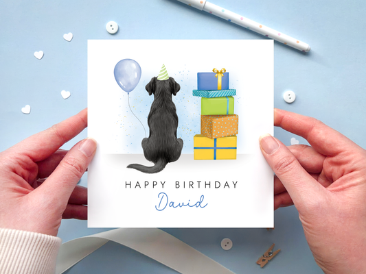 A personalised dog birthday card for him featuring a black labrador.