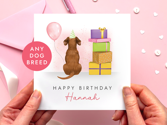 A personalised dog birthday card for her where you can choose any dog breed for the card.