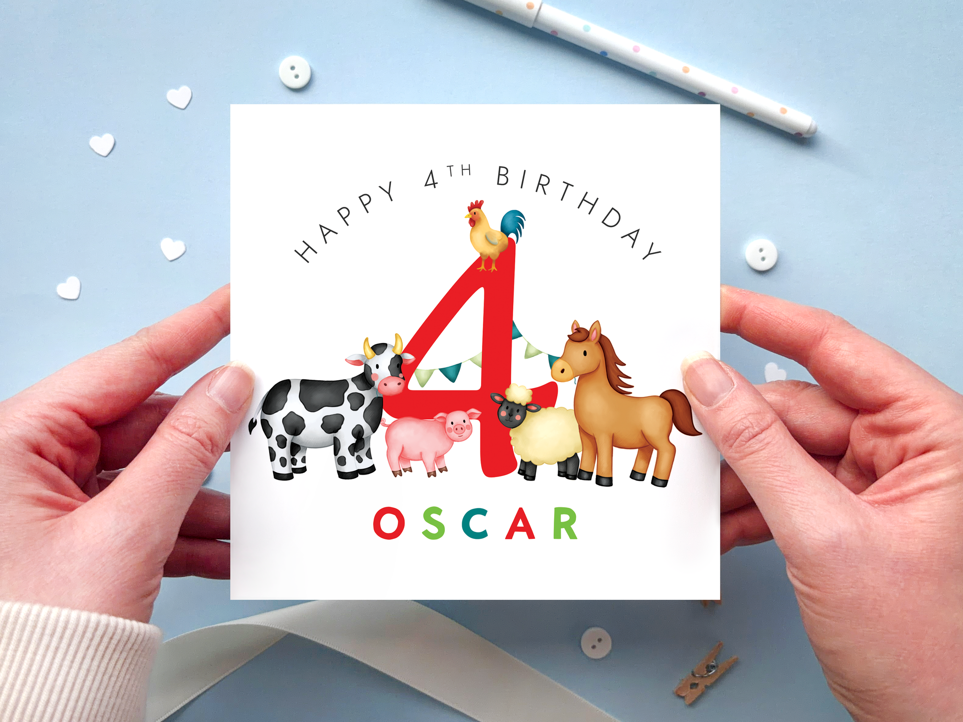 A bold and bright farm themed 4th birthday card for boys. It features a sheep, pig, cow, horse and chicken, around the number four. It can be personalised with the child's name.