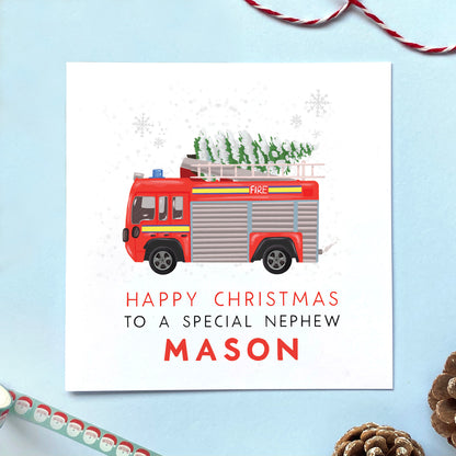 A personalised fire engine Christmas card for Nephew.