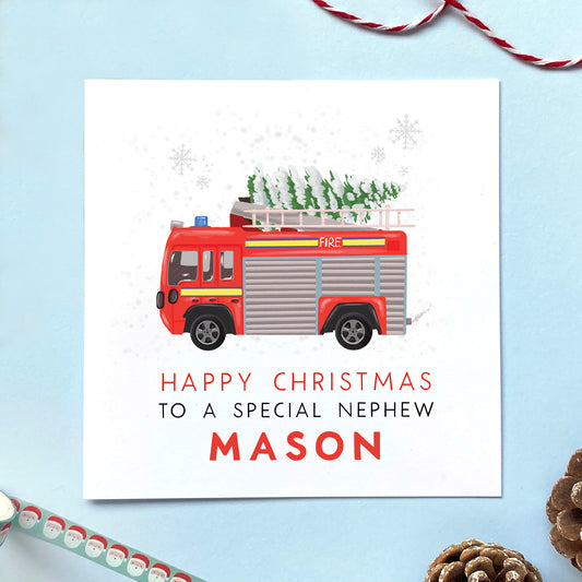 A personalised fire engine Christmas card for Nephew.