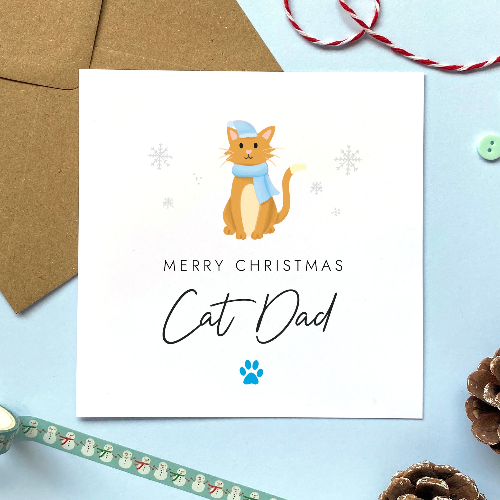 A personalised Christmas card for Cat Dad featuring a ginger and white cat. It can be personalised by changing the relation and the cat. It's designed as a special Christmas card from the cat.