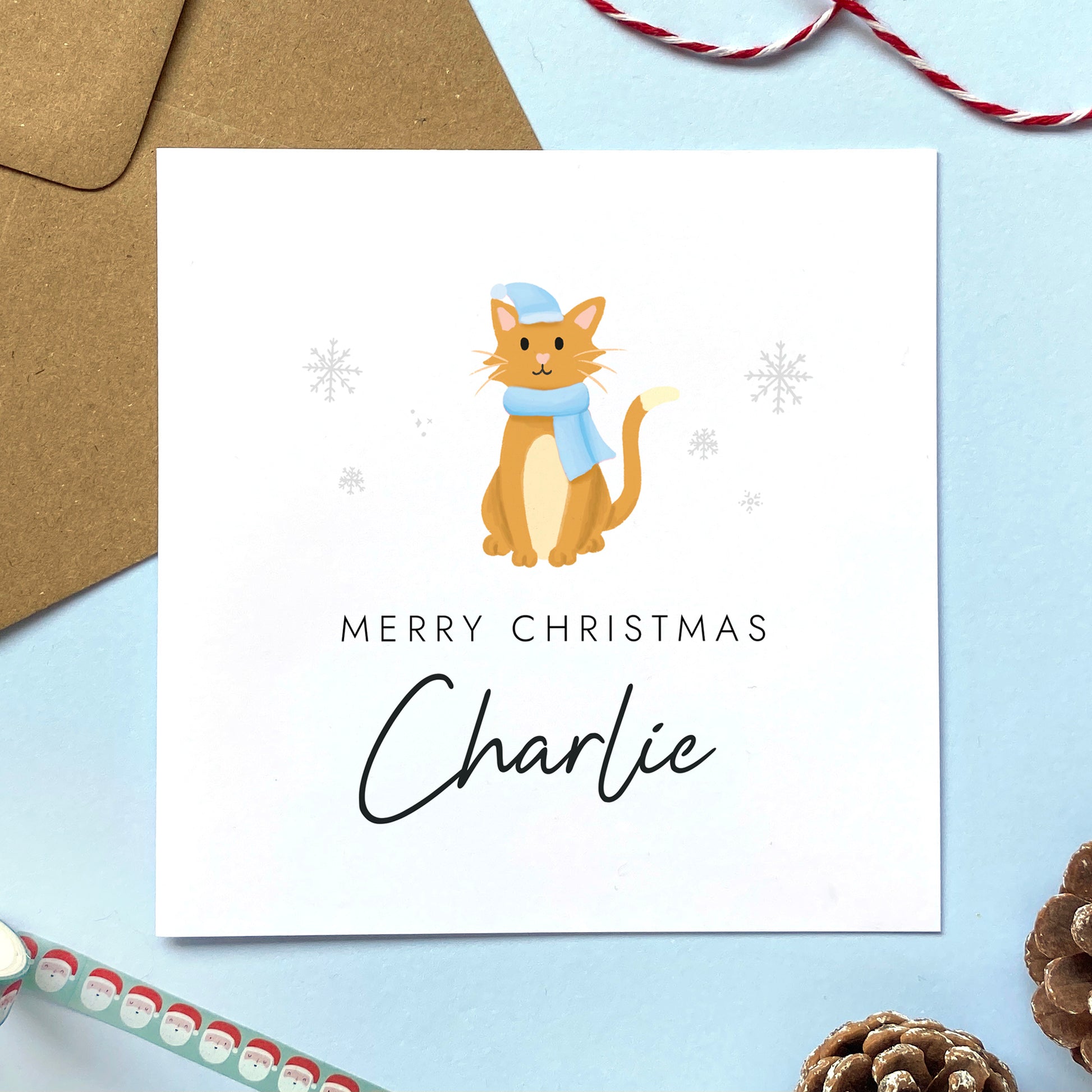 A personalised Christmas card for Him featuring a ginger and white cat. It can be personalised by adding a name or relation. It's designed as a special Christmas card for male relations such as Son, Husband, Brother, Grandson and Dad.