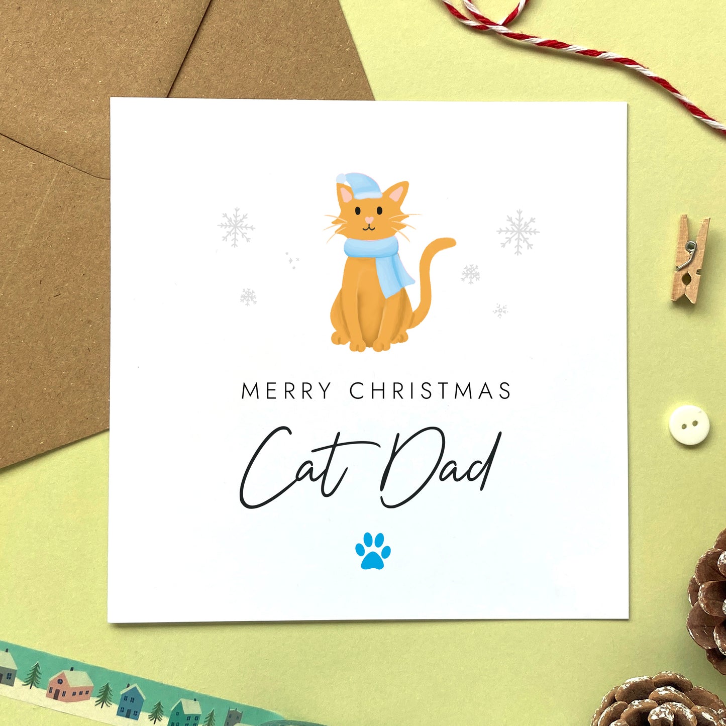 A personalised Christmas card for Cat Dad featuring a ginger cat. It can be personalised by changing the relation and the cat. It's designed as a special Christmas card from the cat.