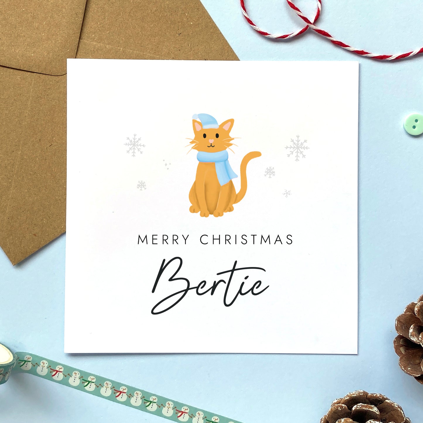 A personalised Christmas card for Him featuring a ginger cat. It can be personalised by adding a name or relation. It's designed as a special Christmas card for male relations such as Son, Husband, Brother, Grandson and Dad.
