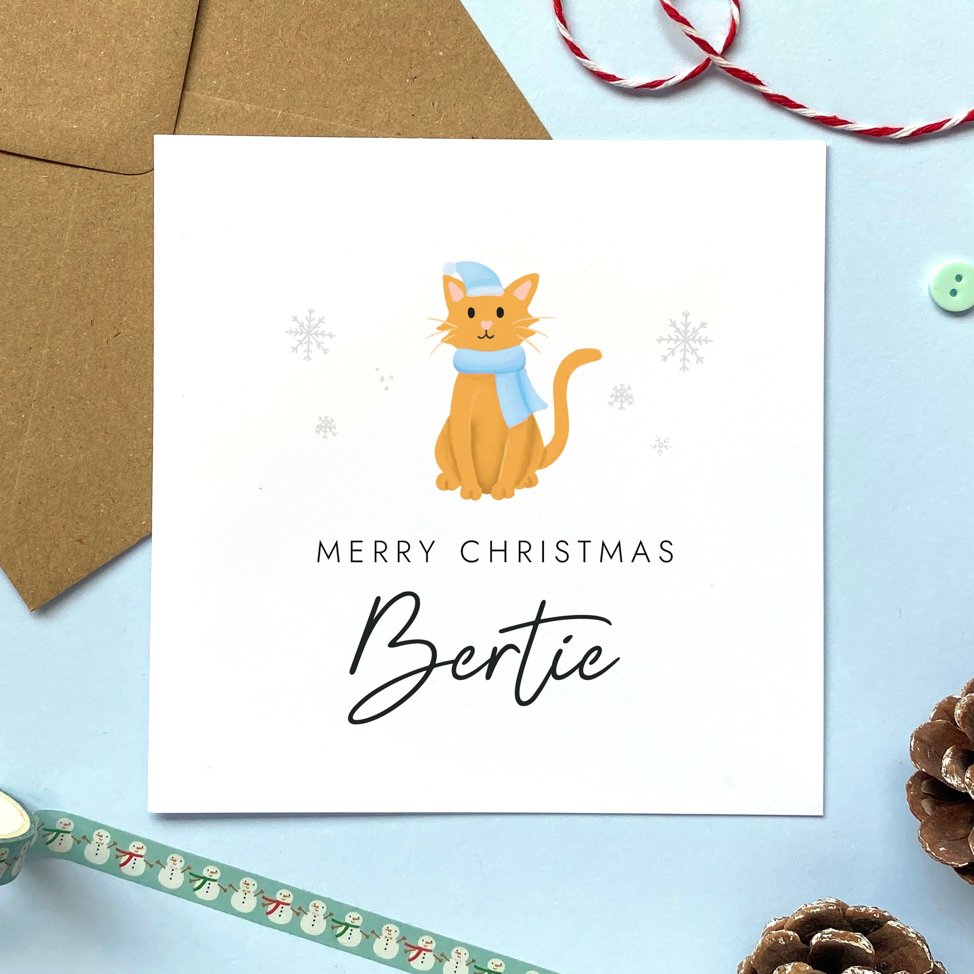 A personalised Christmas card for Him featuring a ginger cat. It can be personalised by adding a name or relation. It's designed as a special Christmas card for male relations such as Son, Husband, Brother, Grandson and Dad.