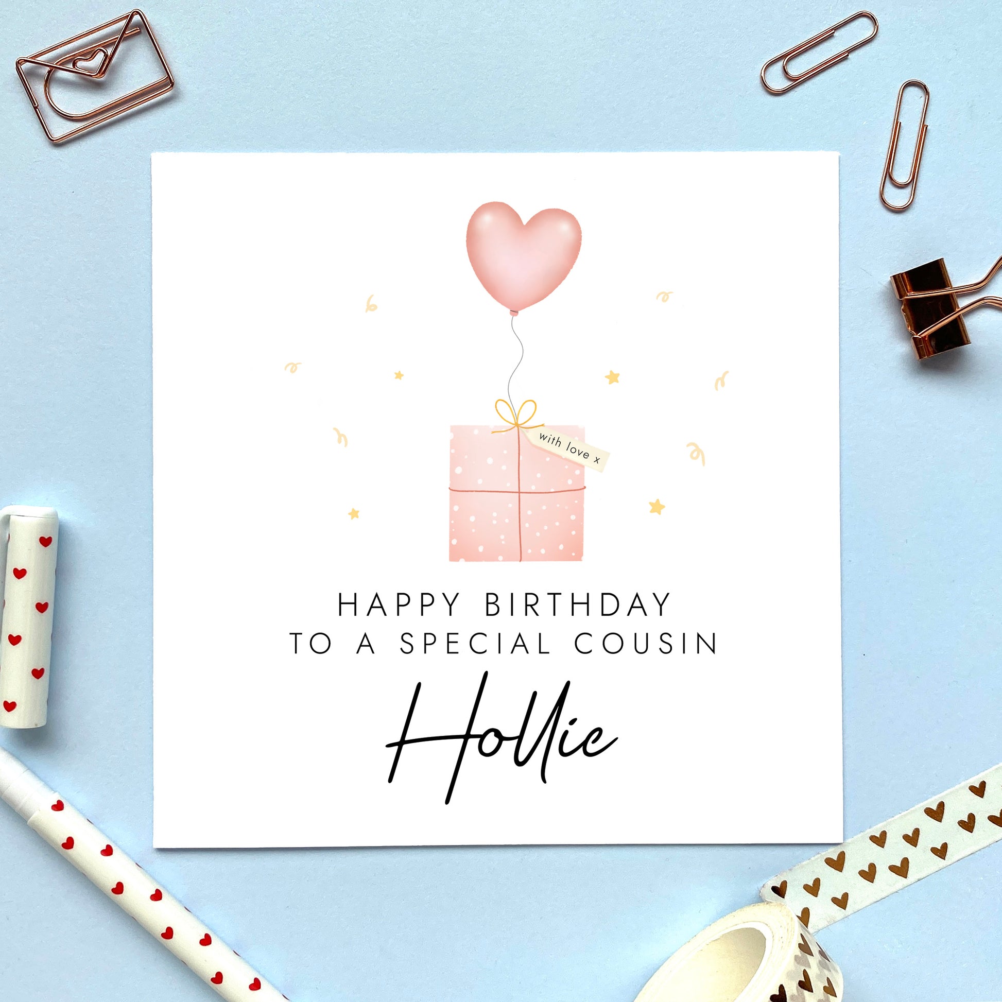 A cute personalised birthday card for Cousin featuring a pink present and heart shaped balloon. It can be personalised with any name and age, including 16th, 18th, 30th and 40th. This card is suitable for any female Cousin.