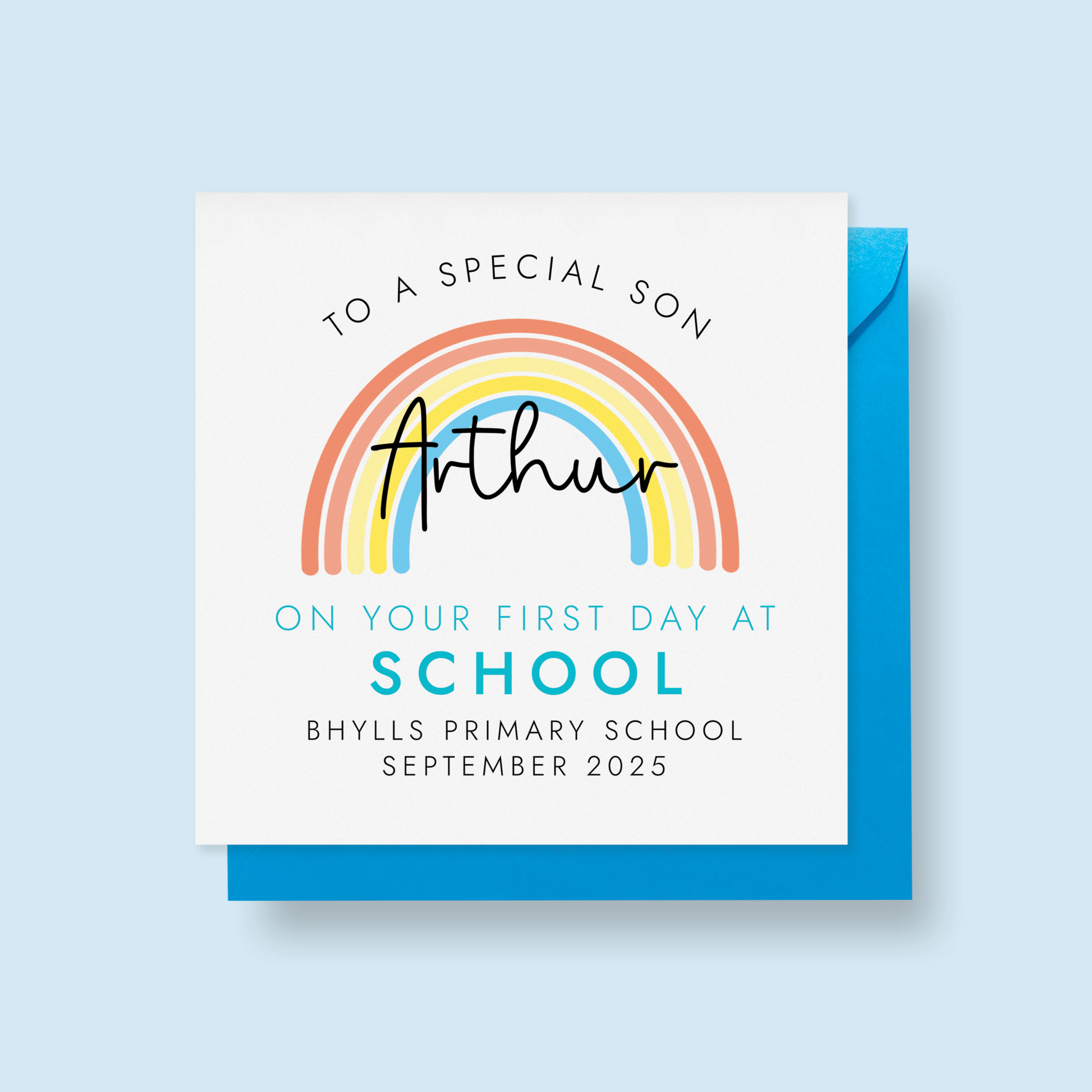 Personalised 1st day at school card for son. It features a bright rainbow with a blue theme. It can be personalised with any boy's name, school name and starting date.