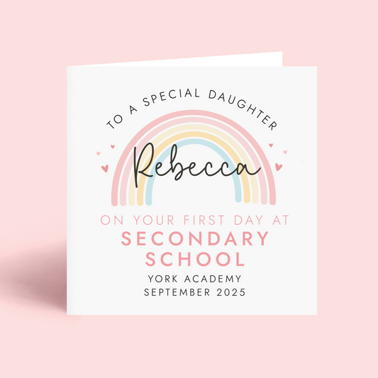 Personalised pink pastel rainbow first day at secondary school card for daughter. It can be personalised with any girl's name, school name and starting date.