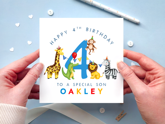 A personalised safari themed 4th birthday card for boys, featuring illustrations of jungle animals - giraffe, crocodile, lion, zebra and monkey - around the number 4, in bright and bold colours