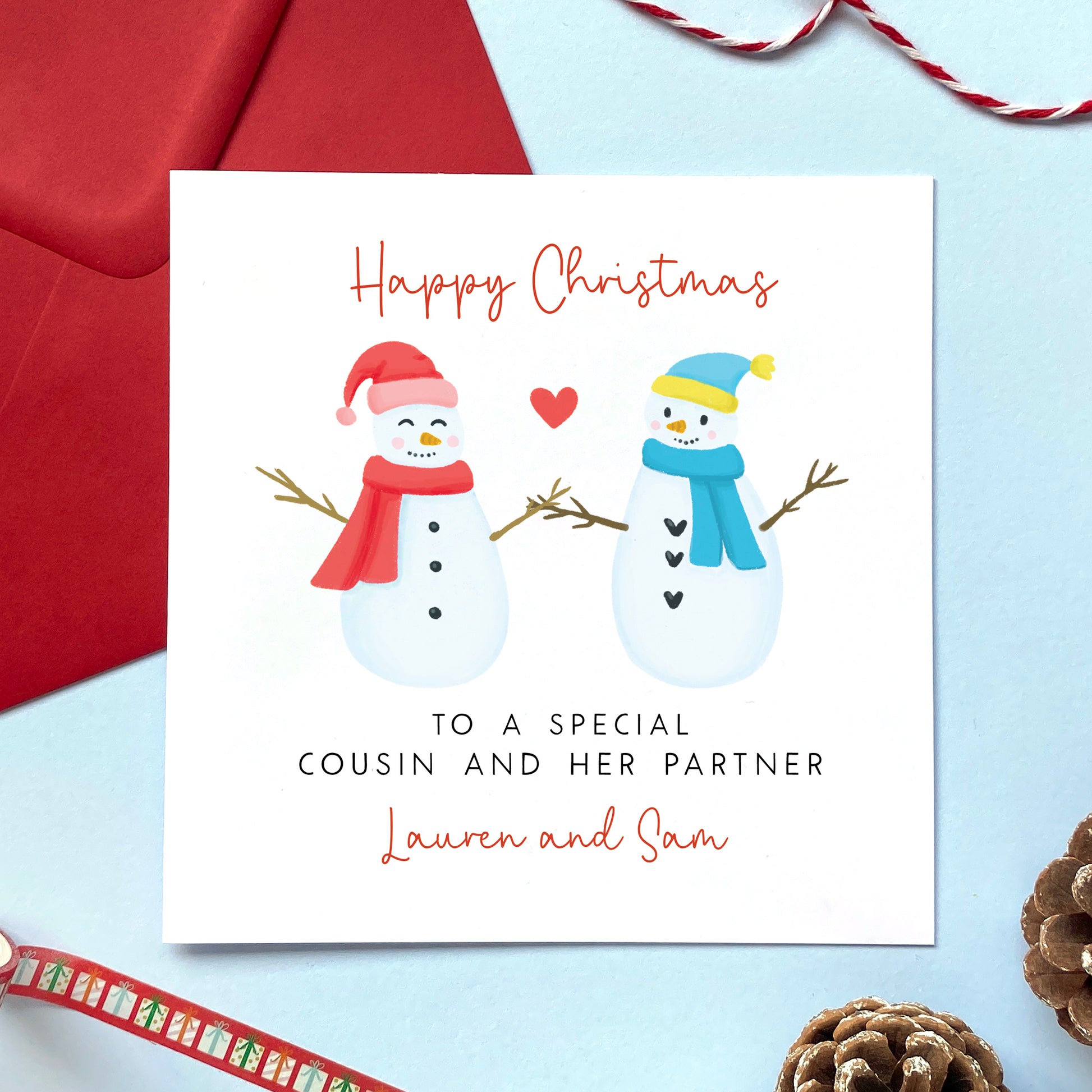 A personalised snowman couple Christmas card for Cousin and her Partner.